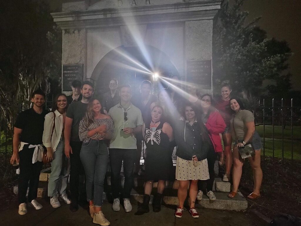 creepy cemetery gate at night on the haunted walking tour